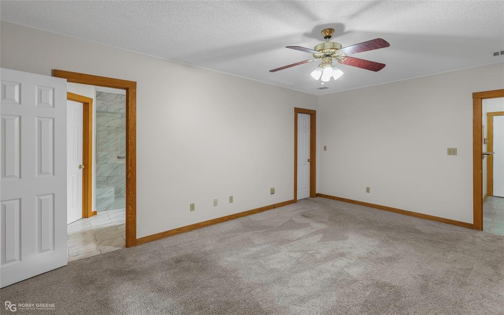 184 Hall Road Stonewall, LA 71078 - Photo 9 of 21 a view of an empty room with a window