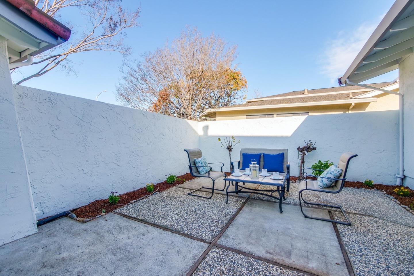 686 Thornapple Drive Sunnyvale, CA 94086 - Photo 16 of 83 a living room with furniture and a potted plant