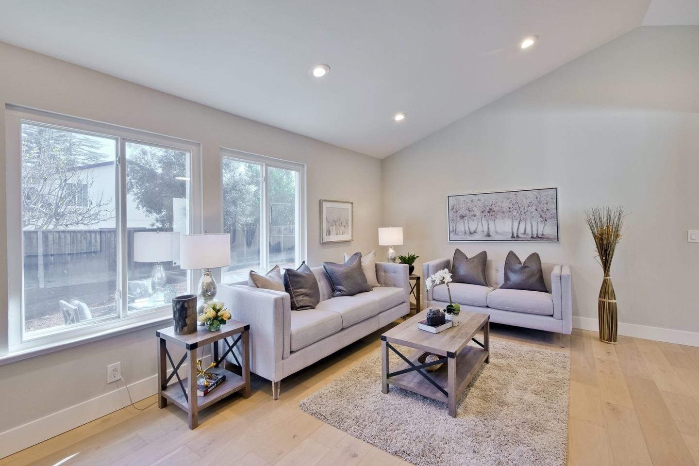 686 Thornapple Drive Sunnyvale, CA 94086 - Photo 20 of 83 a living room with furniture and a large window