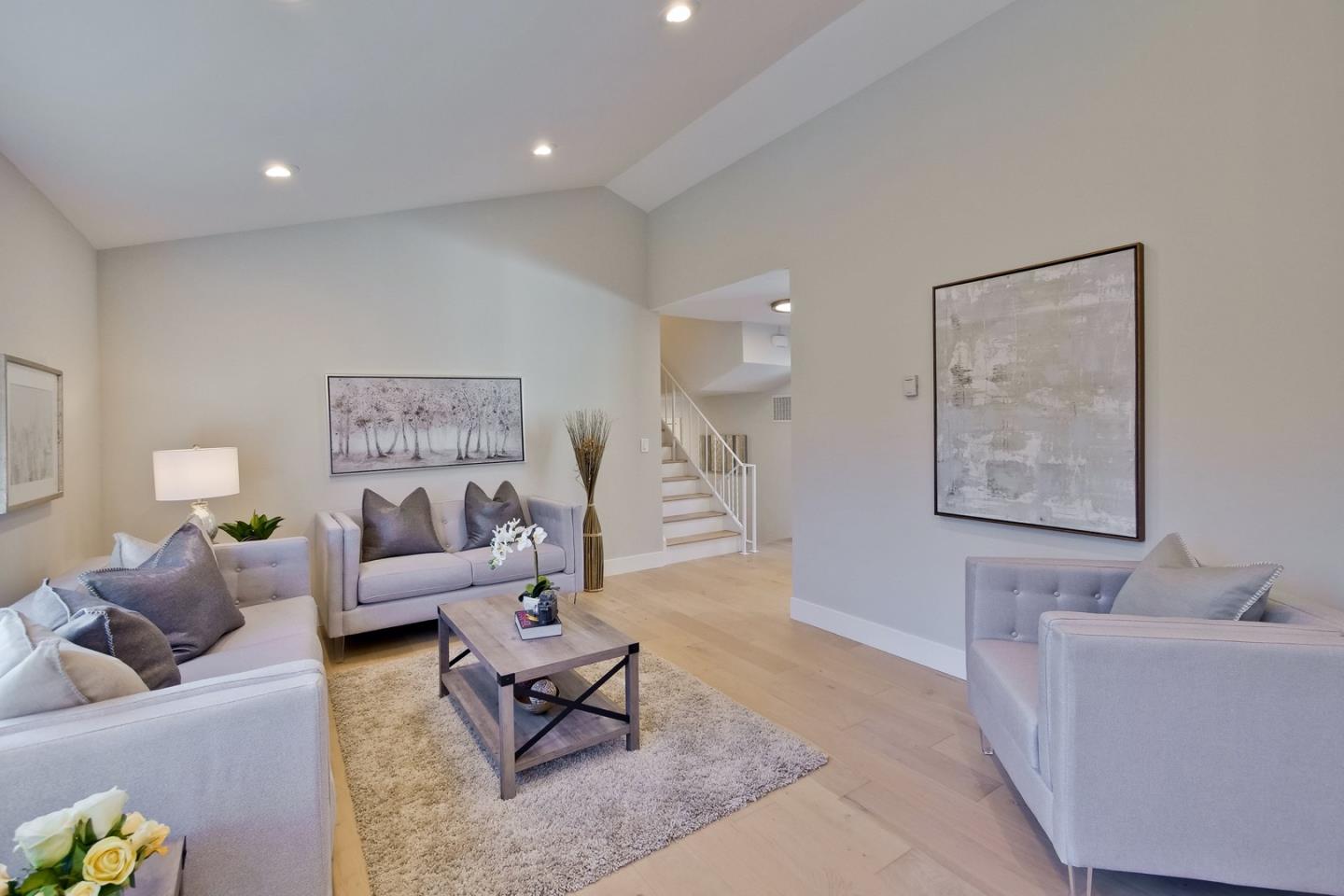 686 Thornapple Drive Sunnyvale, CA 94086 - Photo 21 of 83 a living room with furniture and a rug