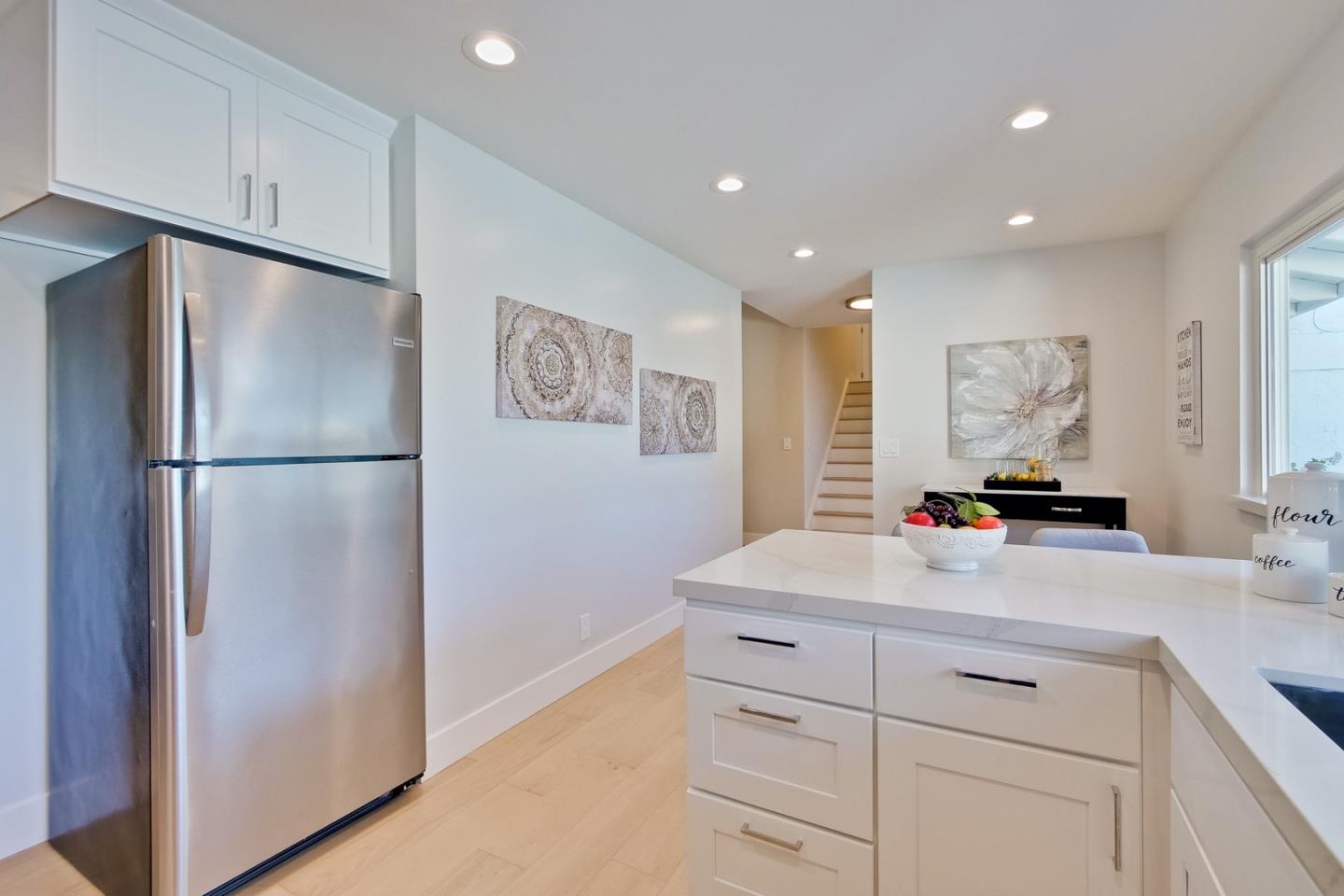 686 Thornapple Drive Sunnyvale, CA 94086 - Photo 31 of 83 a bathroom with a sink and a refrigerator