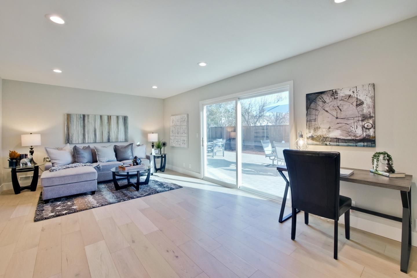 686 Thornapple Drive Sunnyvale, CA 94086 - Photo 43 of 83 a living room with furniture and a large window