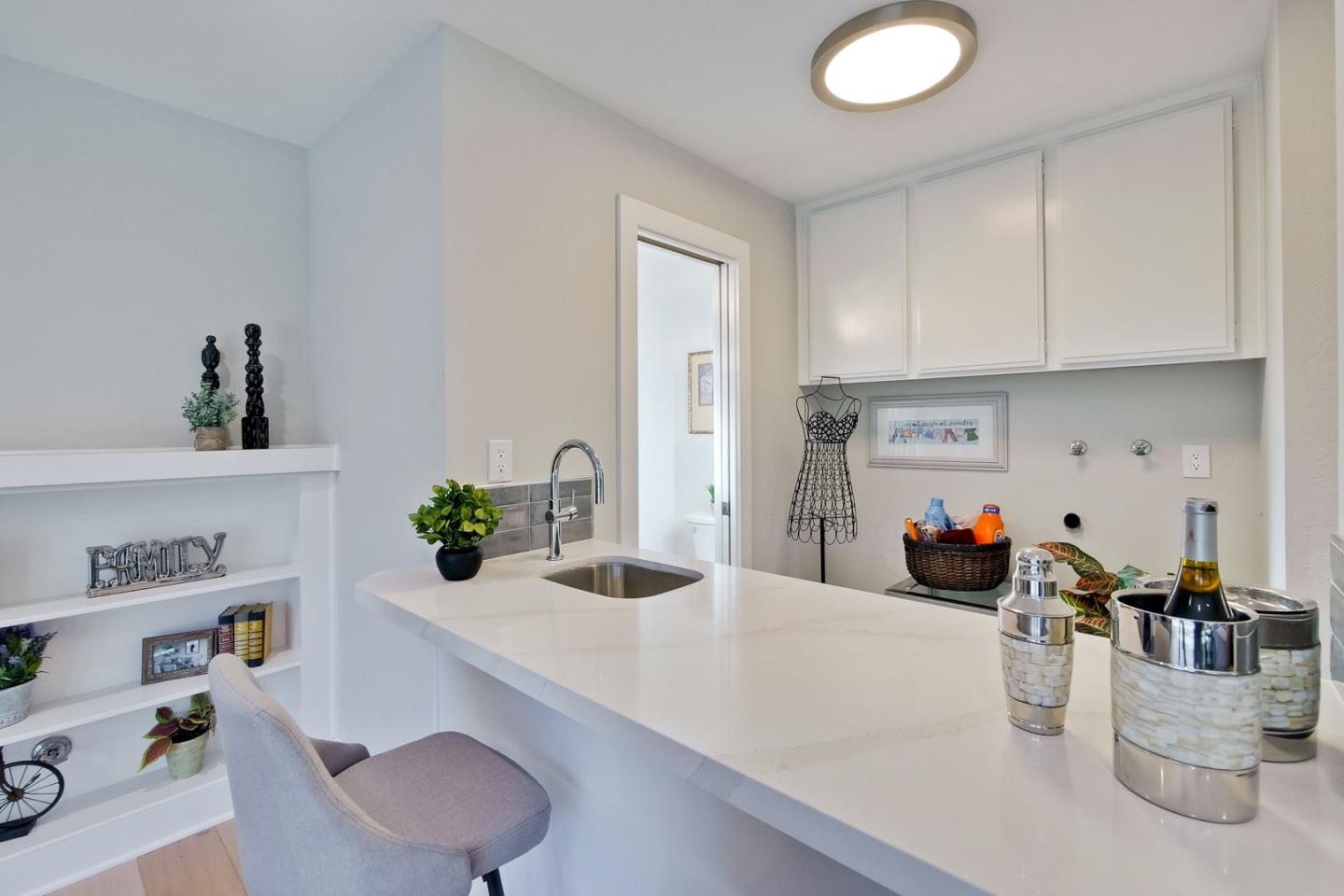 686 Thornapple Drive Sunnyvale, CA 94086 - Photo 47 of 83 a kitchen with a sink and a refrigerator