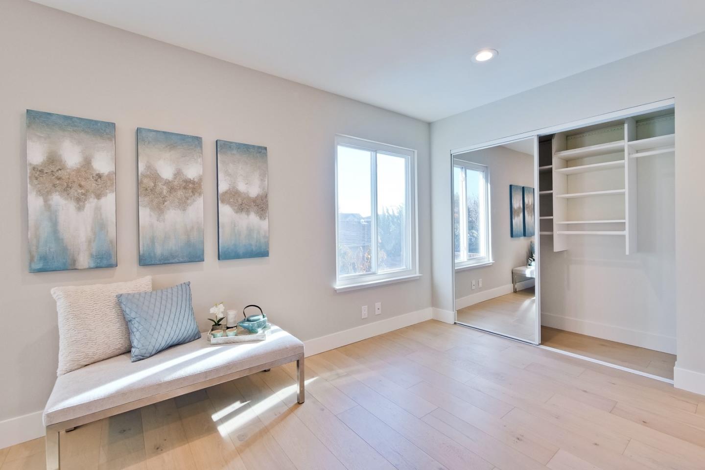 686 Thornapple Drive Sunnyvale, CA 94086 - Photo 56 of 83 a living room with furniture and large windows