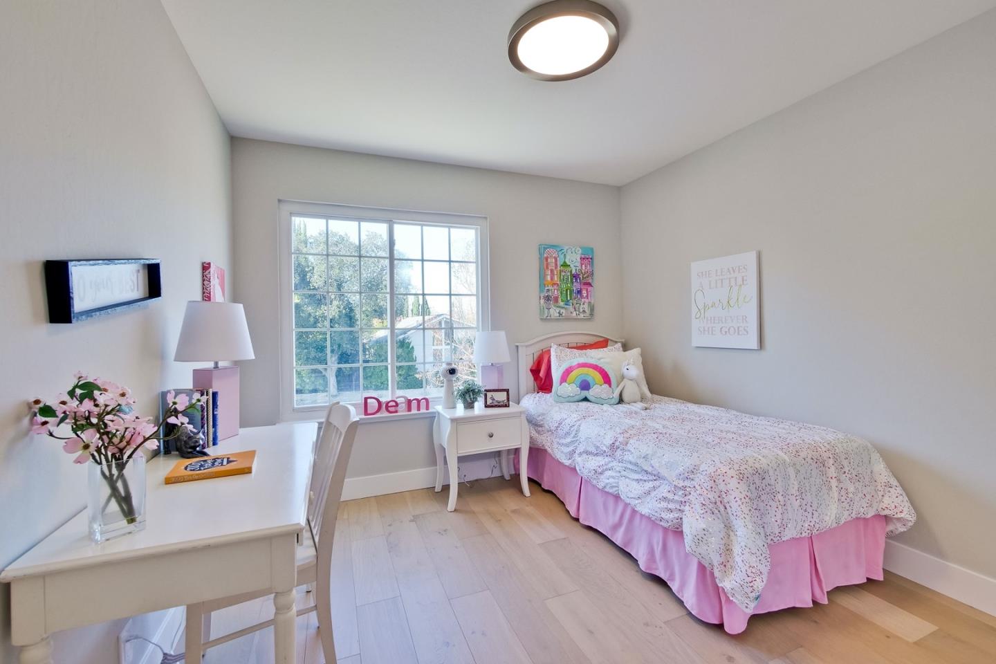 686 Thornapple Drive Sunnyvale, CA 94086 - Photo 63 of 83 a bedroom with a bed and window