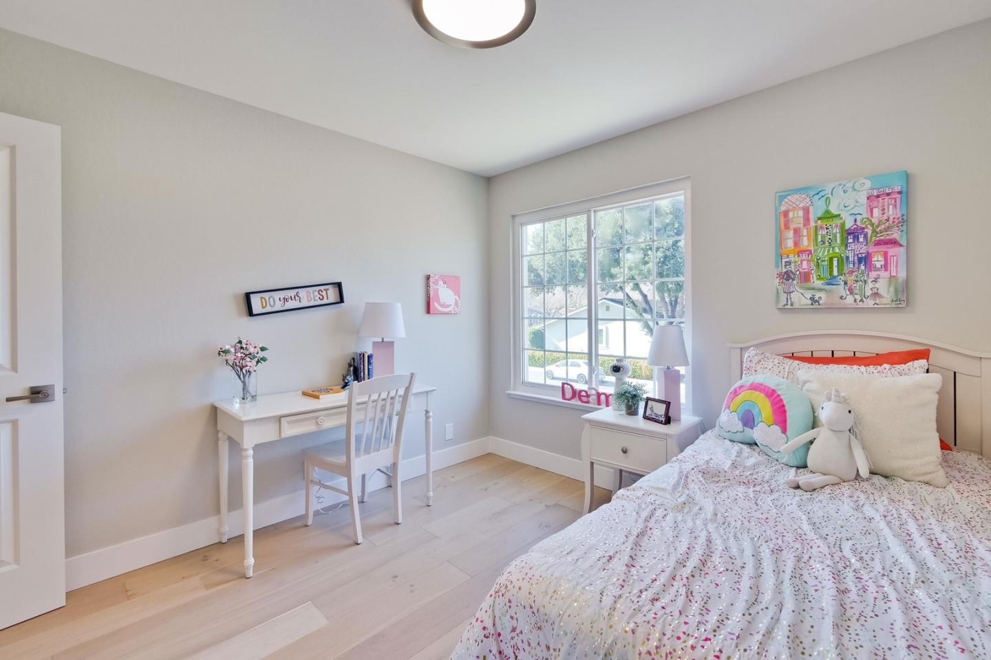 686 Thornapple Drive Sunnyvale, CA 94086 - Photo 64 of 83 a bedroom with a bed and a window