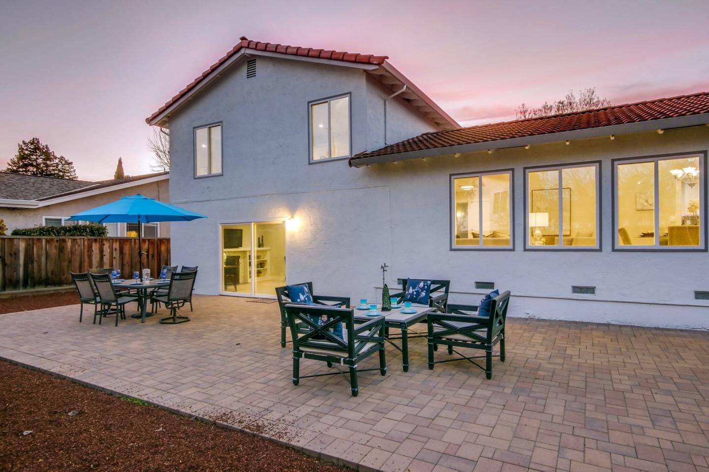 686 Thornapple Drive Sunnyvale, CA 94086 - Photo 76 of 83 a view of a house with patio and a garden