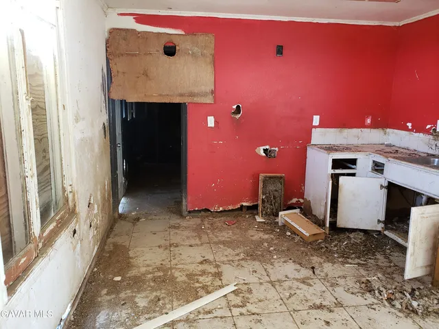 a view of a fireplace with mirror