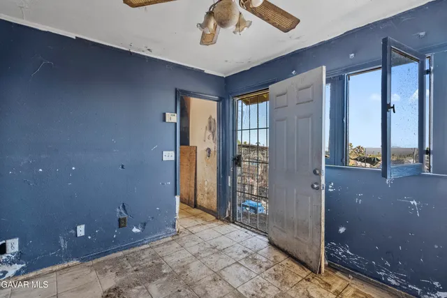 a bathroom with a toilet sink and shower