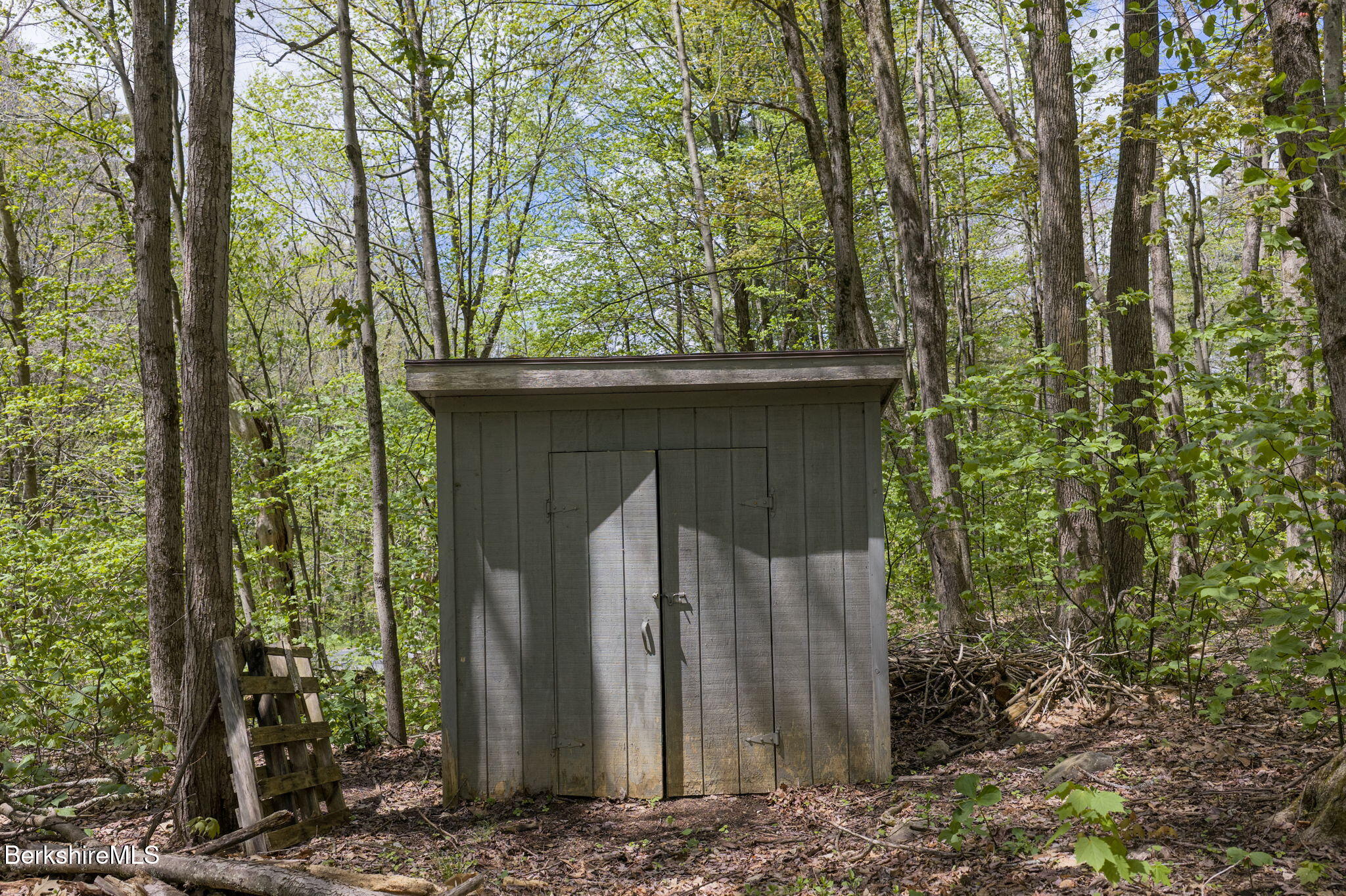 1874 Home Road Sheffield, MA 01230 - Photo 42 of 42 a view of a wooden house with large trees