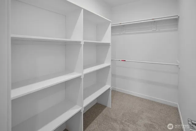 a view of an empty walk in closet