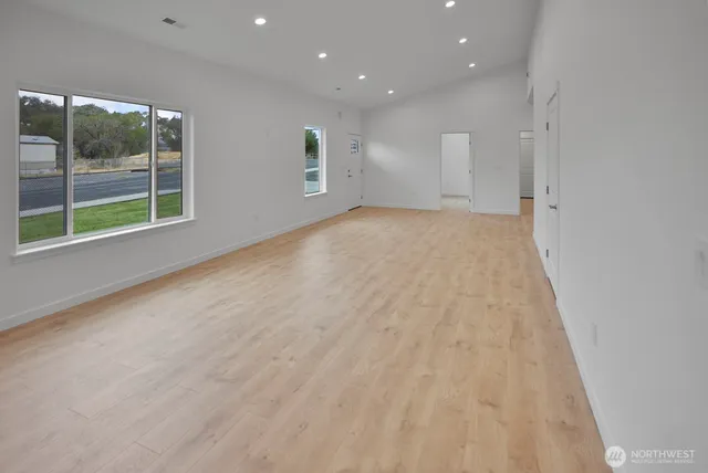 an empty room with windows