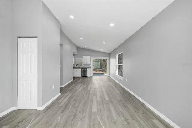 a view of kitchen with wooden floor