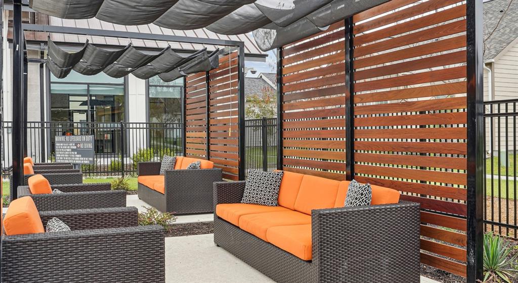 5725 Tanzanite Lane Fort Worth, TX 76123 - Photo 18 of 27 a balcony with furniture and a large window