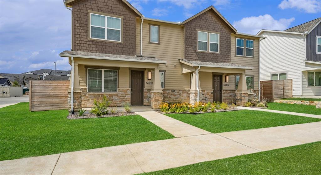 5725 Tanzanite Lane Fort Worth, TX 76123 - Photo 2 of 27 a front view of a house with a yard