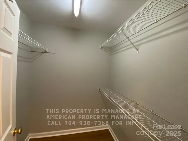 a view of a room with racks on the wall