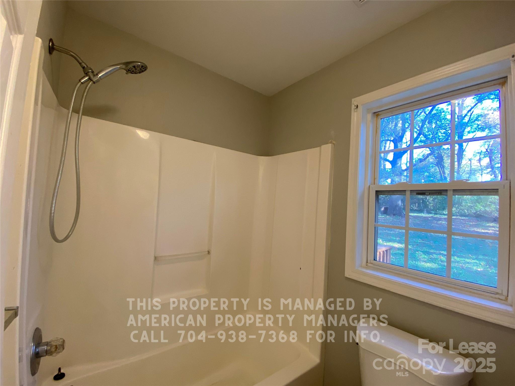 5620 Charlie Walker Road Kannapolis, NC 28081 - Photo 8 of 12 a bathroom with a shower