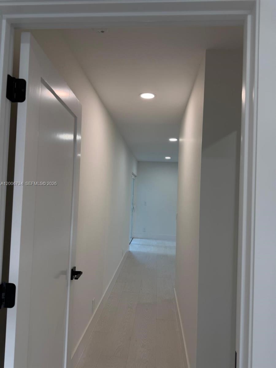 7917 Chula Vista Crescent Boca Raton, FL 33433 - Photo 17 of 28 a view of a hallway
