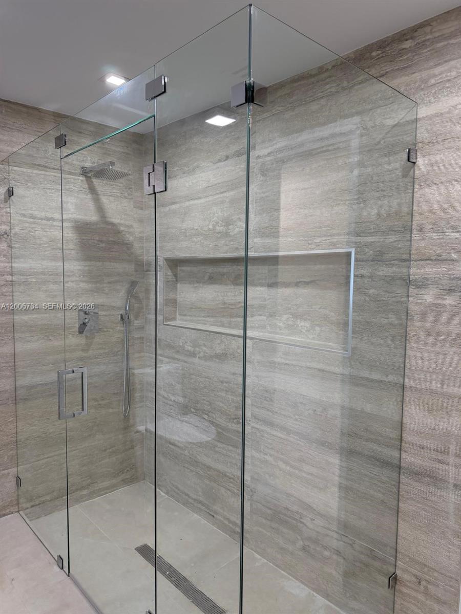 7917 Chula Vista Crescent Boca Raton, FL 33433 - Photo 19 of 28 a bathroom with a shower