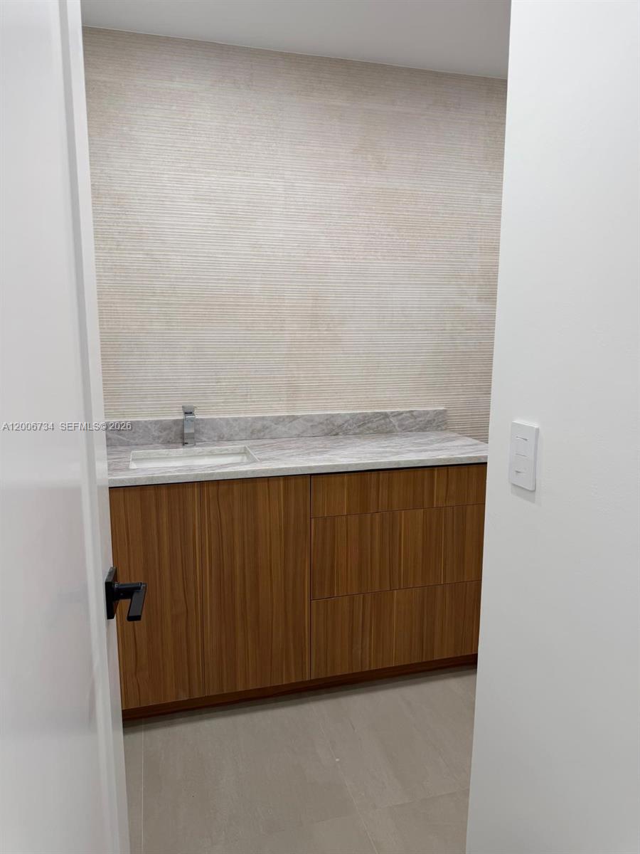 7917 Chula Vista Crescent Boca Raton, FL 33433 - Photo 21 of 28 a close up view of wooden cabinets