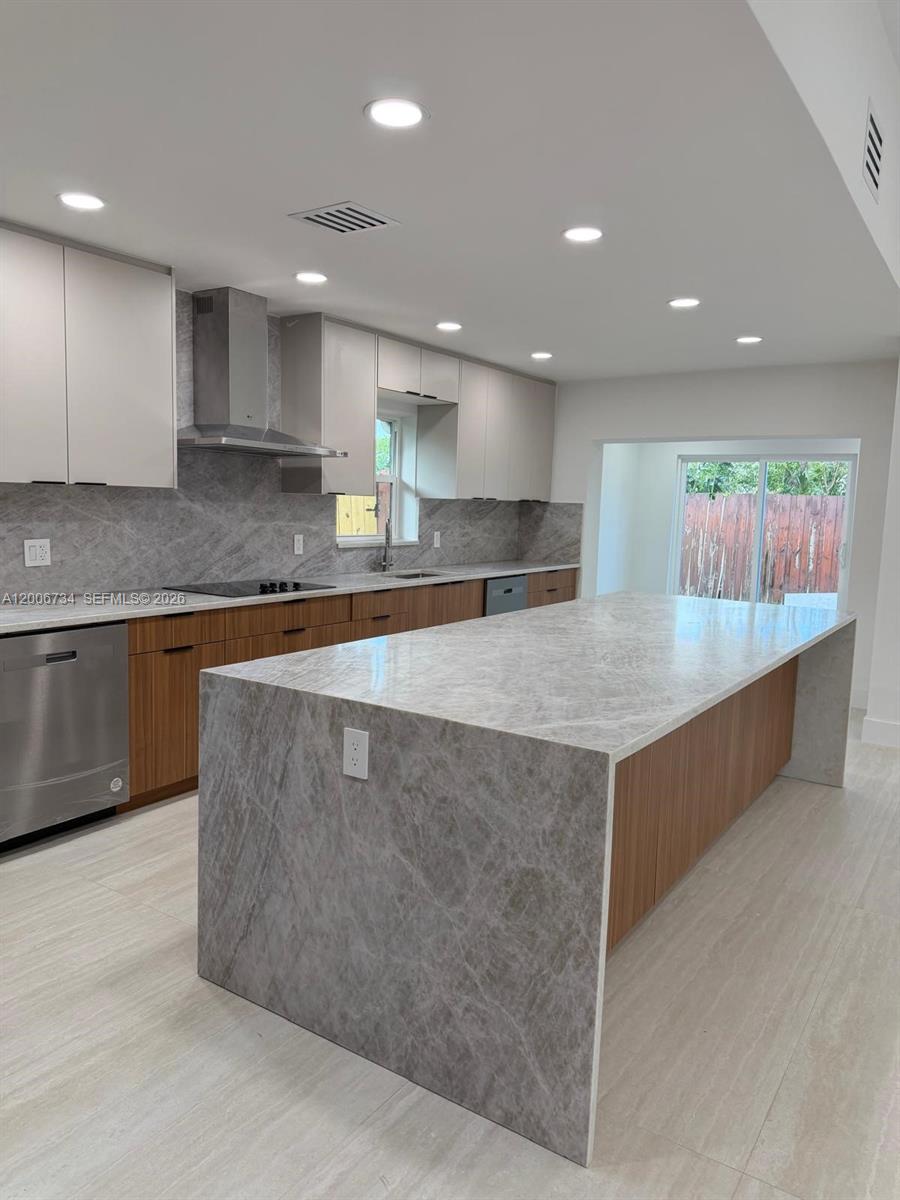 7917 Chula Vista Crescent Boca Raton, FL 33433 - Photo 3 of 28 a large kitchen with stainless steel appliances lots of counter top space