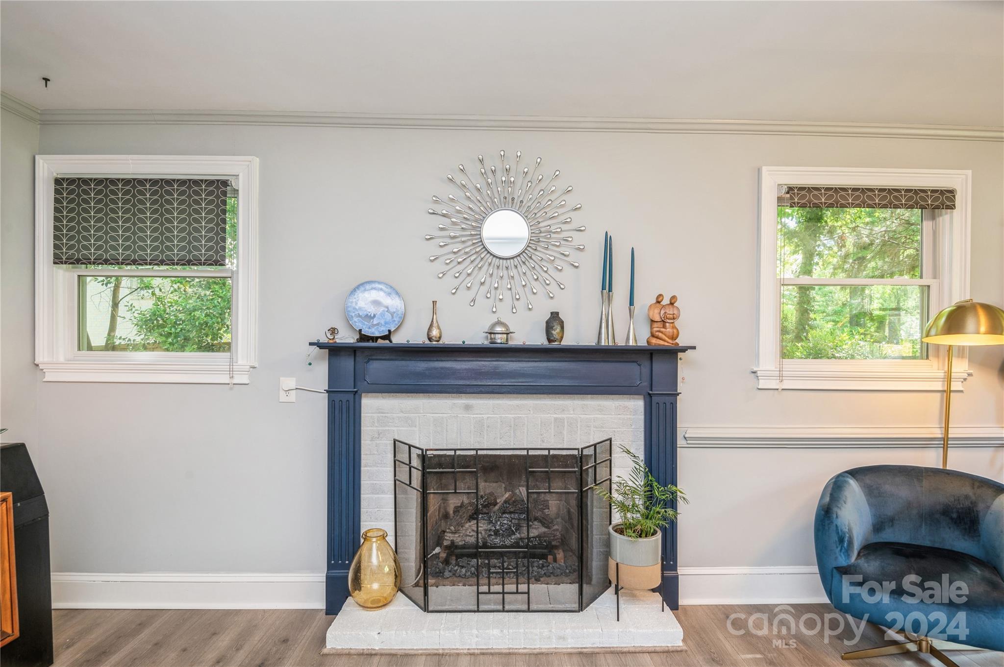 4027 Rutherford Drive Charlotte, NC 28210 - Photo 26 of 48 a living room with furniture and a fireplace