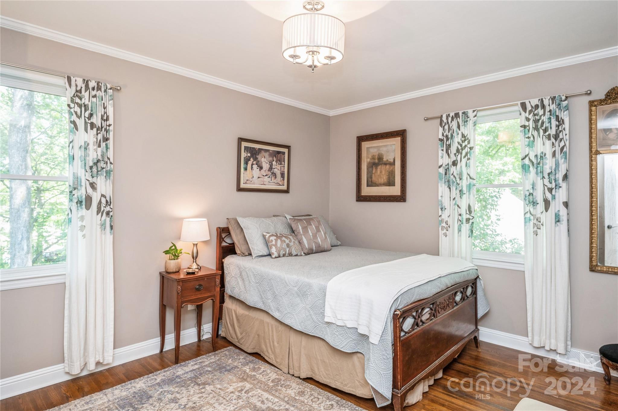 4027 Rutherford Drive Charlotte, NC 28210 - Photo 30 of 48 a bedroom with a bed and a window