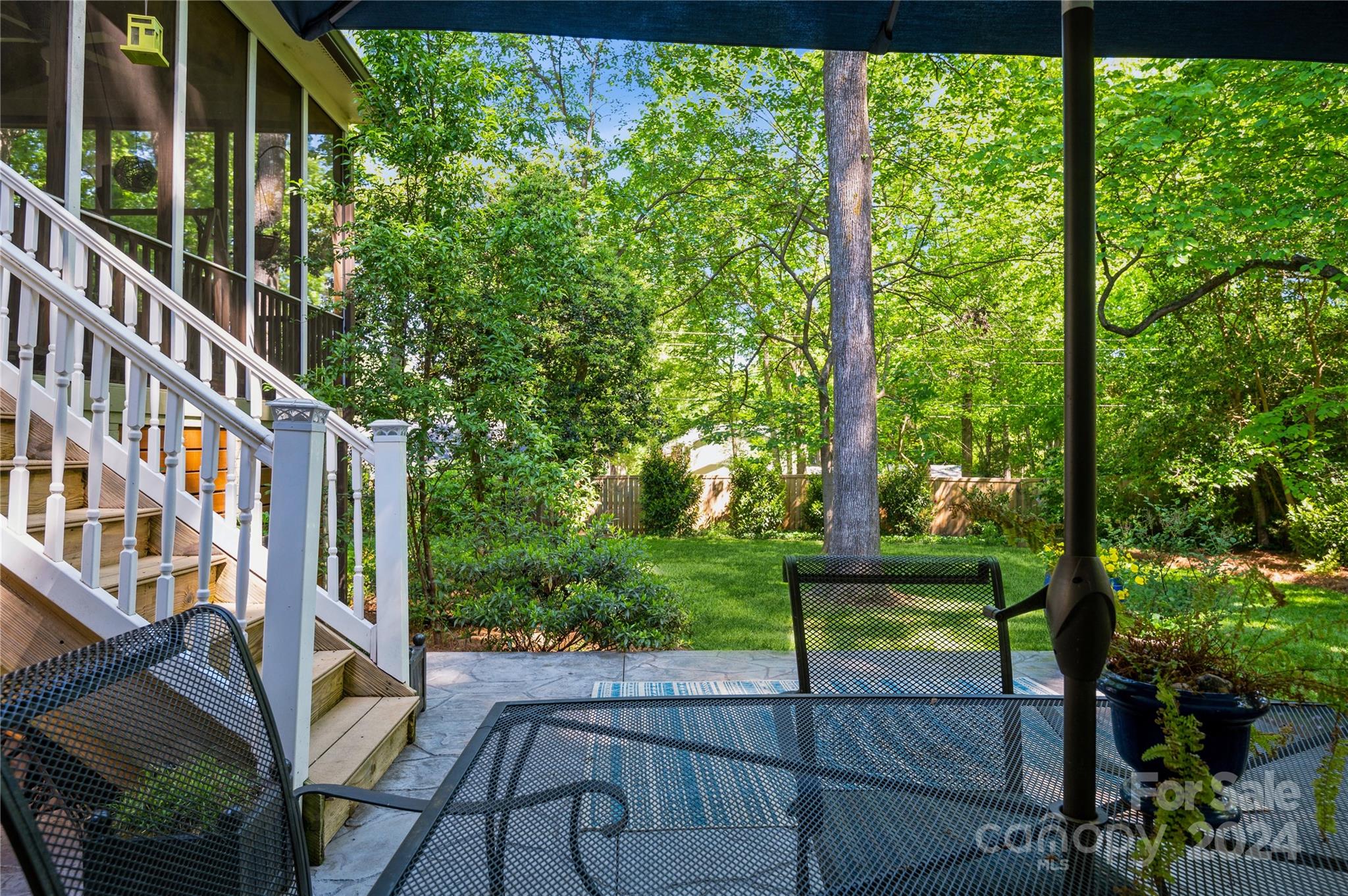 4027 Rutherford Drive Charlotte, NC 28210 - Photo 39 of 48 a view of a porch with a yard