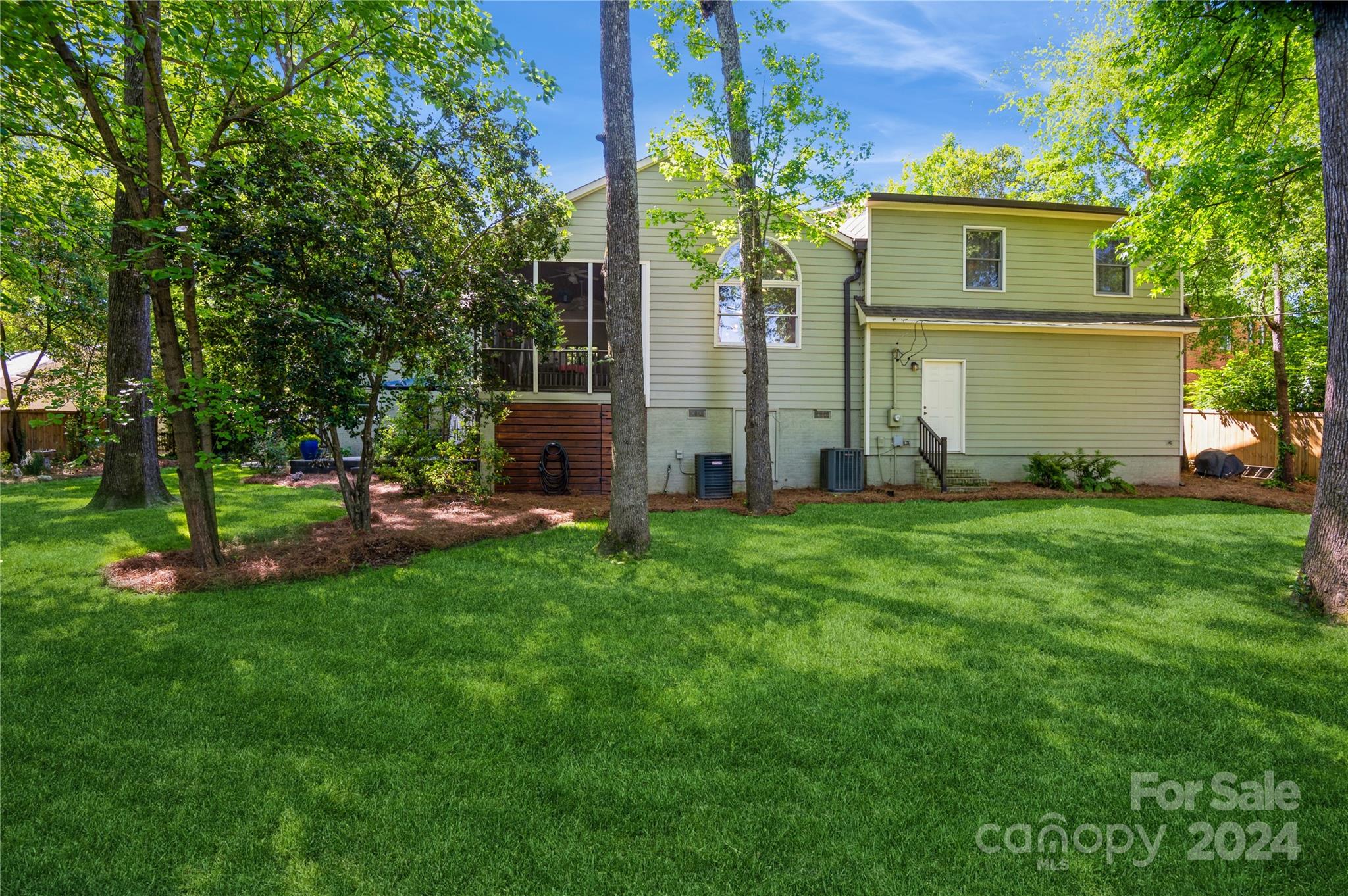 4027 Rutherford Drive Charlotte, NC 28210 - Photo 40 of 48 a front view of a house with garden