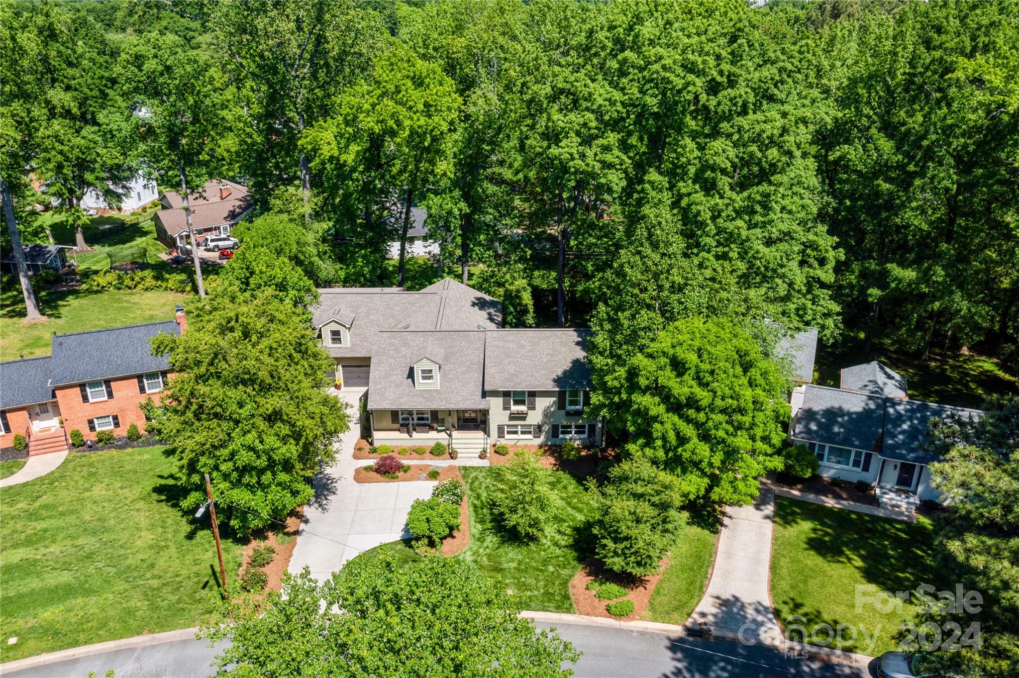 4027 Rutherford Drive Charlotte, NC 28210 - Photo 43 of 48 an aerial view of a house with a yard basket ball court and outdoor seating