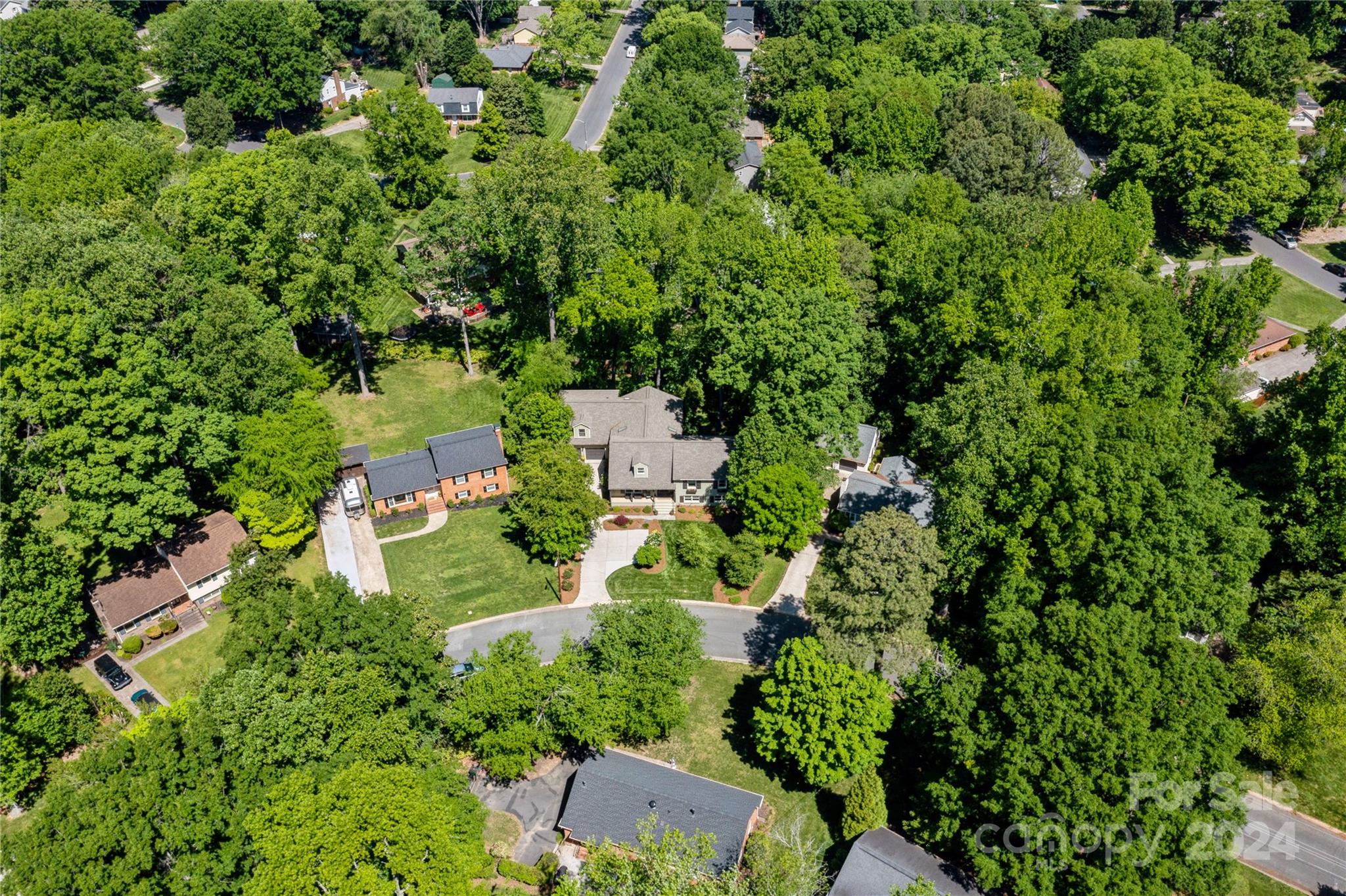 4027 Rutherford Drive Charlotte, NC 28210 - Photo 45 of 48 an aerial view of residential house with outdoor space and trees all around