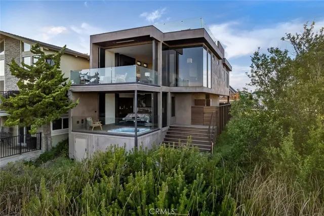 a kitchen with a table chairs stove and kitchen view