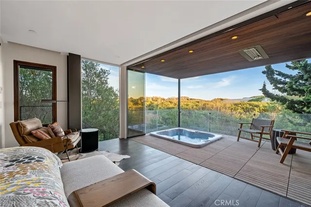 a bathroom with a glass shower door and a glass door shower