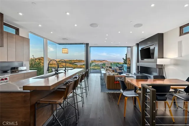 a living room with fireplace furniture and a flat screen tv