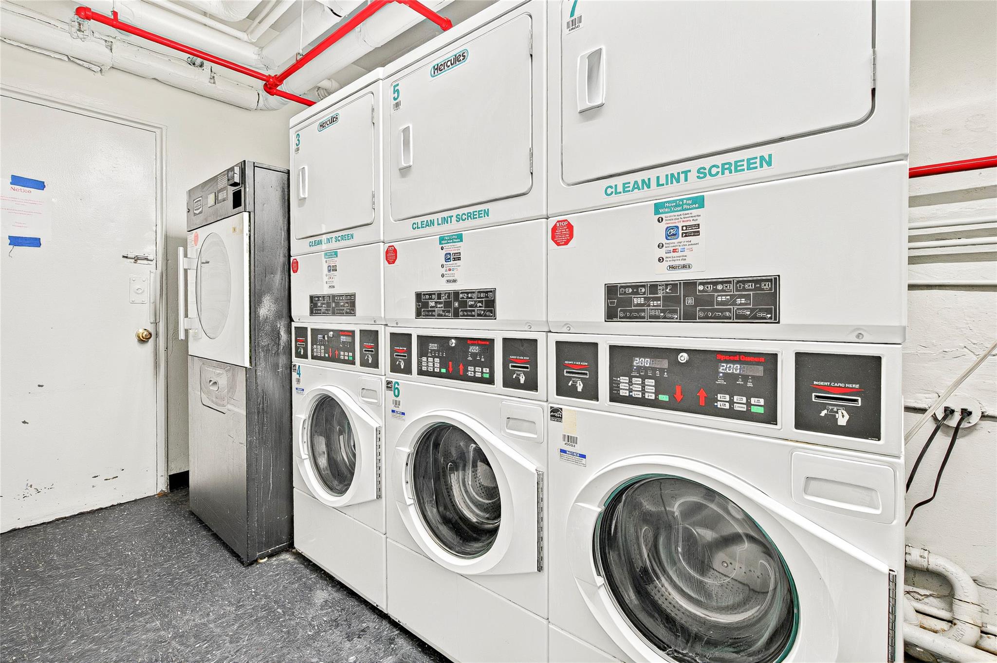 3176 Decatur Avenue, Unit 1I Bronx, NY 10467 - Photo 15 of 16 Shared laundry with stacked washing machine and dryer and washing machine and clothes dryer