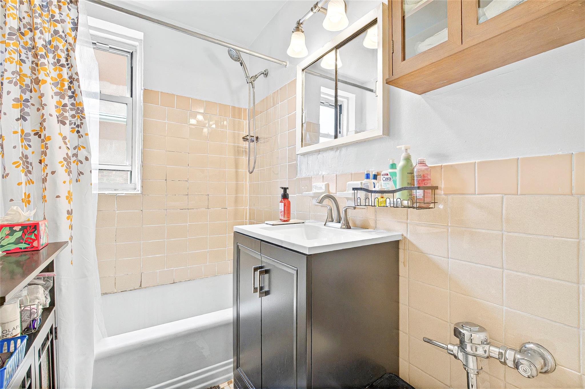 3176 Decatur Avenue, Unit 1I Bronx, NY 10467 - Photo 5 of 16 Bathroom with tile walls, shower / bath combo, and vanity