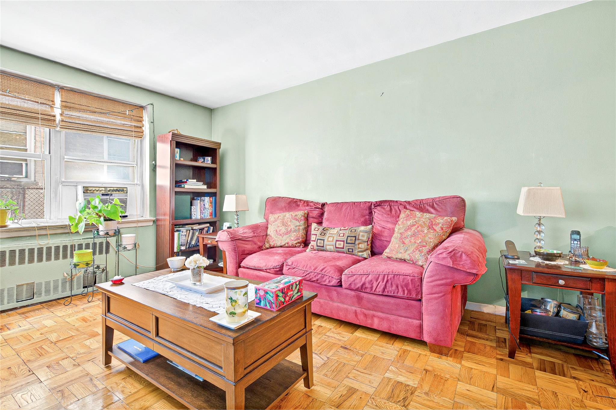 3176 Decatur Avenue, Unit 1I Bronx, NY 10467 - Photo 8 of 16 Living room featuring radiator