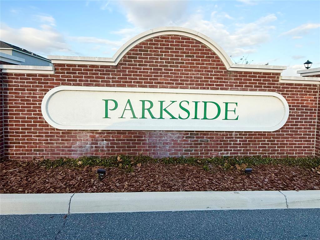 1126 Calico Pointe Circle Groveland, FL 34736 - Photo 21 of 28 a sign broad in front of a building
