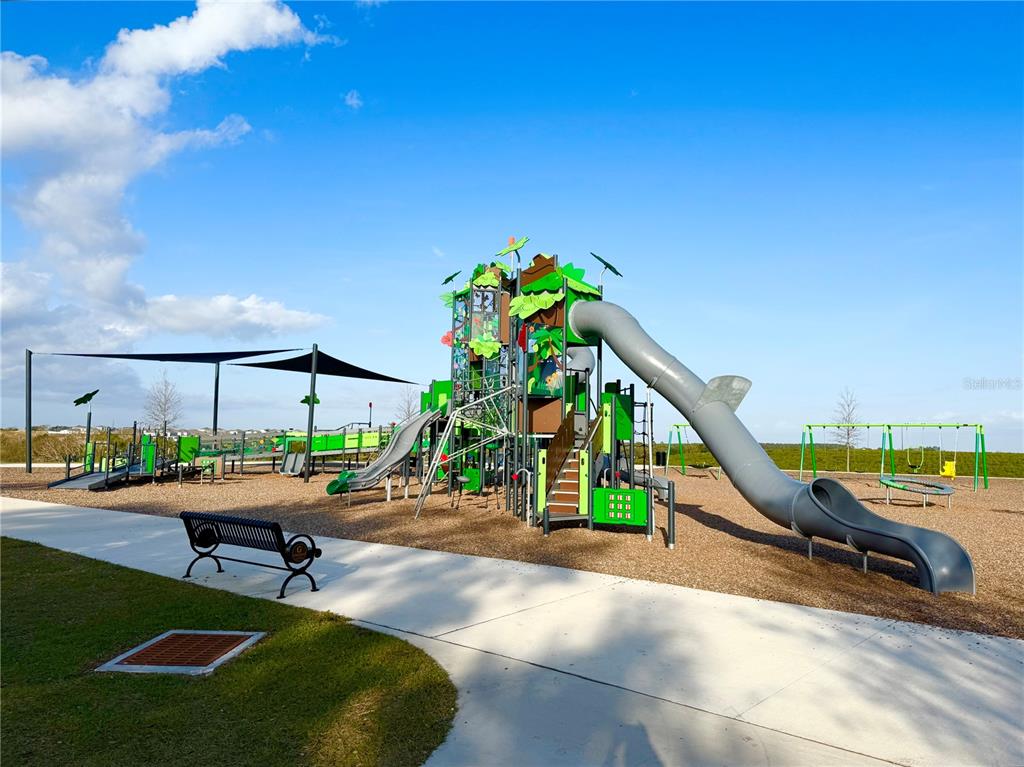1126 Calico Pointe Circle Groveland, FL 34736 - Photo 23 of 28 a garden view with a seating space