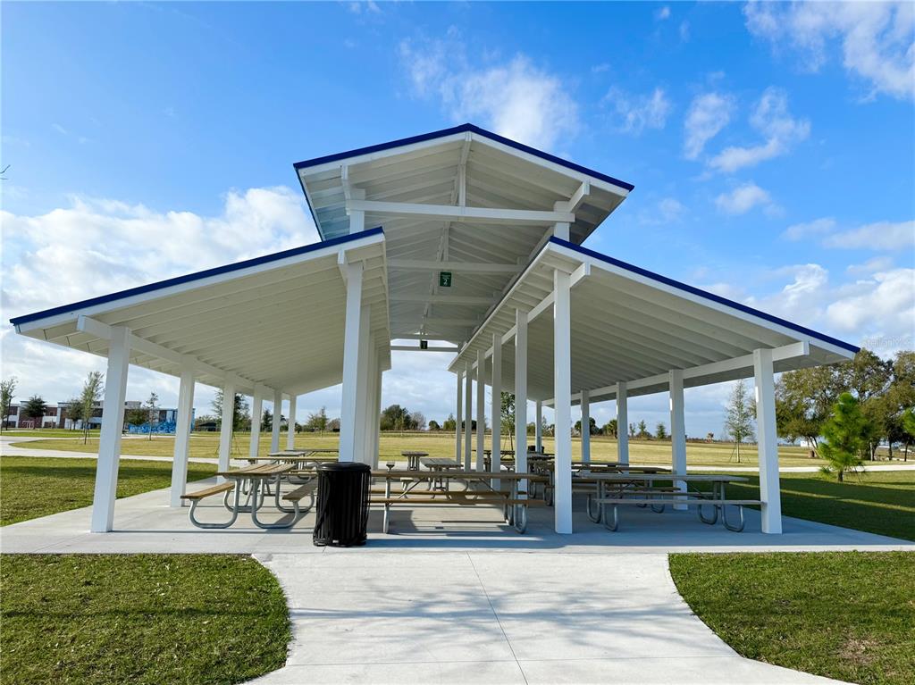 1126 Calico Pointe Circle Groveland, FL 34736 - Photo 26 of 28 a view of a chairs and table in the patio