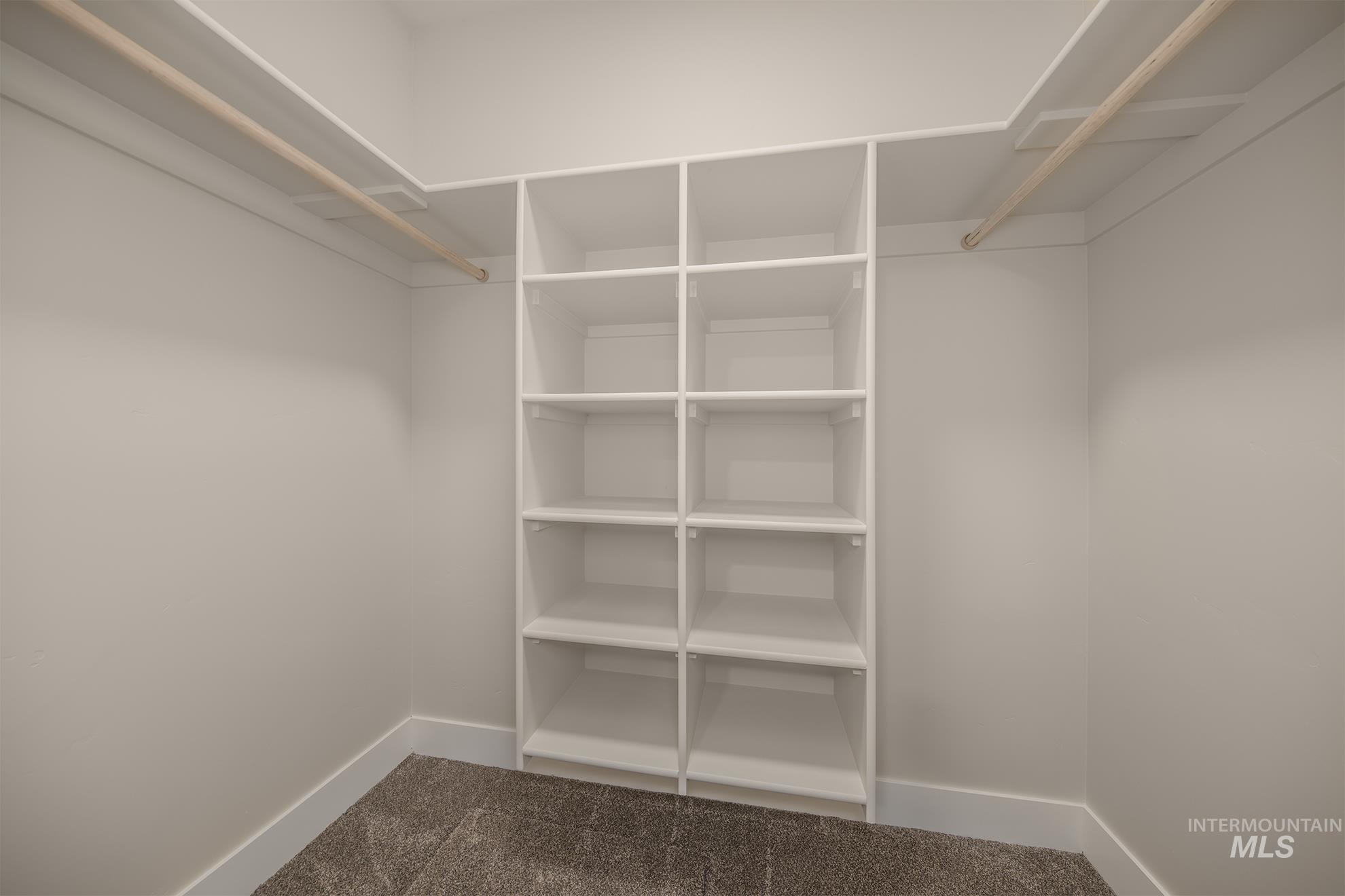 1367 Hansen Road Weiser, ID 83672 - Photo 16 of 36 Walk in closet featuring dark carpet
