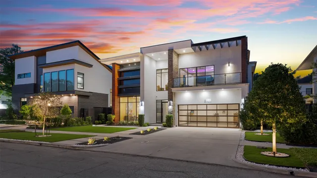 a view of a dining room with furniture a chandelier and wooden floor