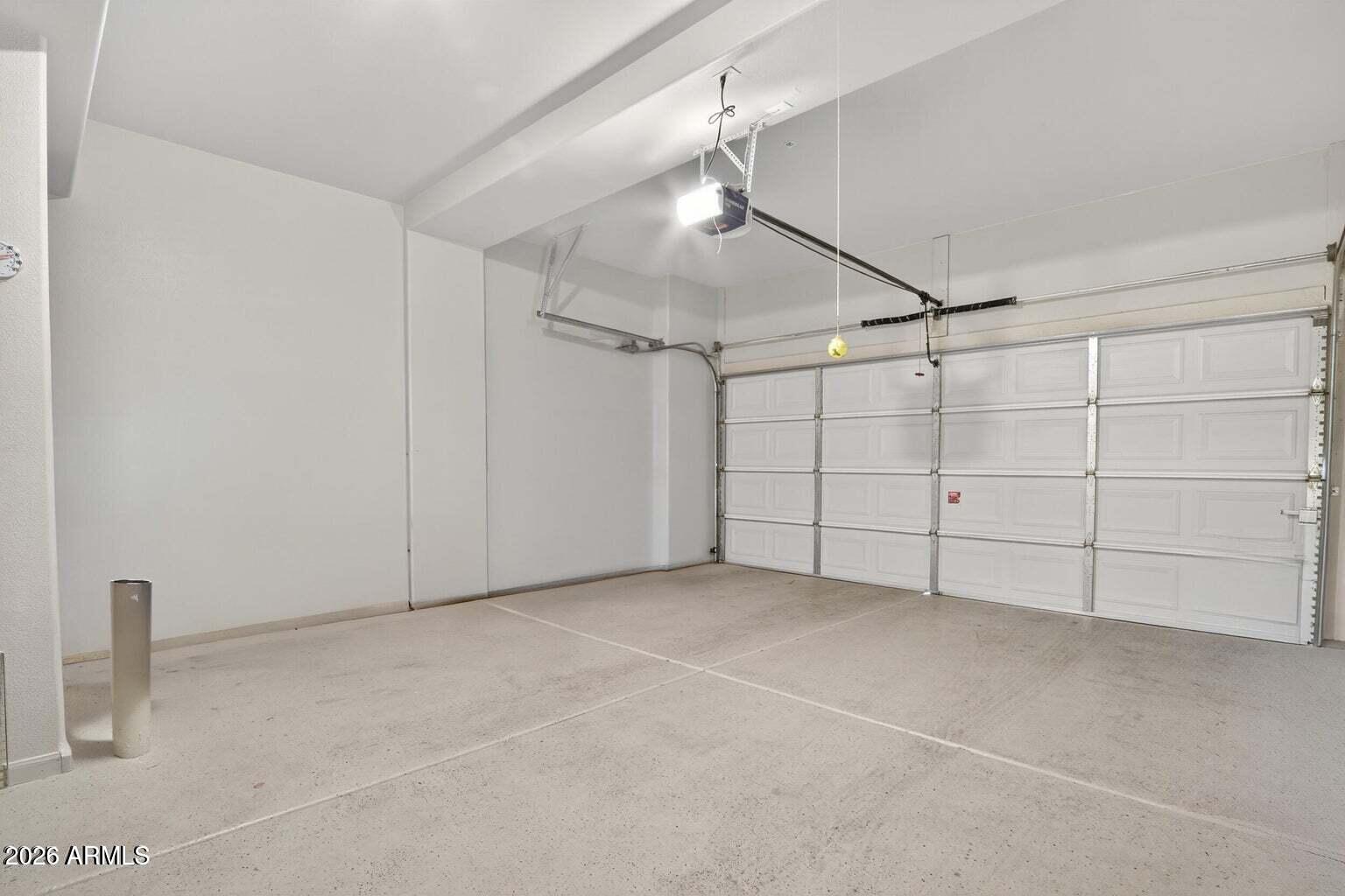 8245 East Bell Road, Unit 121 Scottsdale, AZ 85260 - Photo 20 of 22 a view of a garage