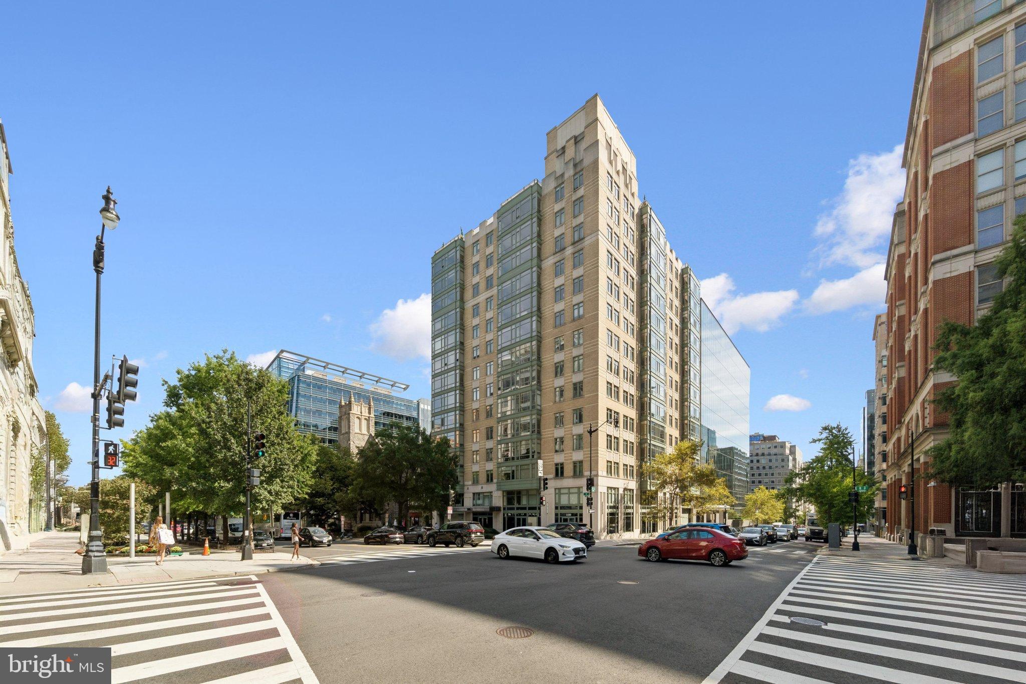 1150 K Street Northwest, Unit 1111 Washington, DC 20005 - Photo 1 of 36 a view of a street with cars