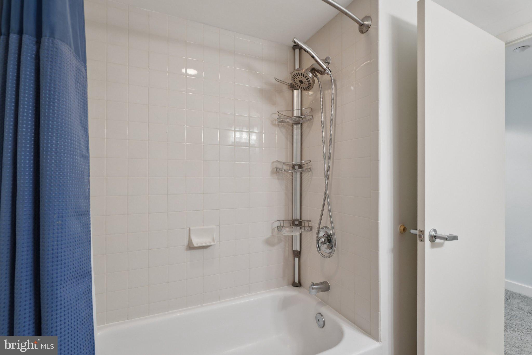 1150 K Street Northwest, Unit 1111 Washington, DC 20005 - Photo 18 of 36 a bathroom with a bathtub