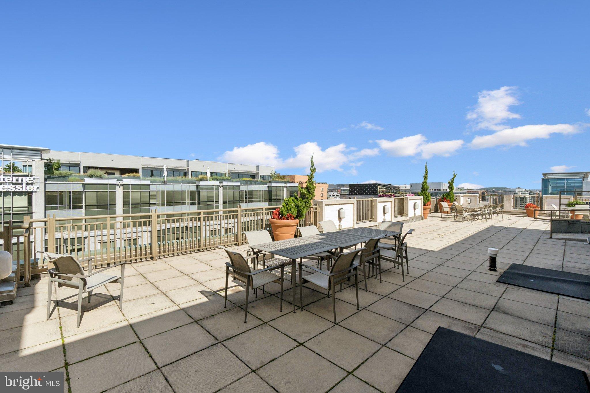 1150 K Street Northwest, Unit 1111 Washington, DC 20005 - Photo 28 of 36 a view of a terrace with chairs