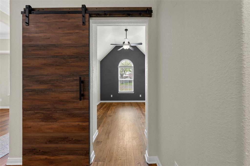 8224 Forest Ridge Drive Woodway, TX 76712 - Photo 13 of 38 a view of hallway with wooden floor
