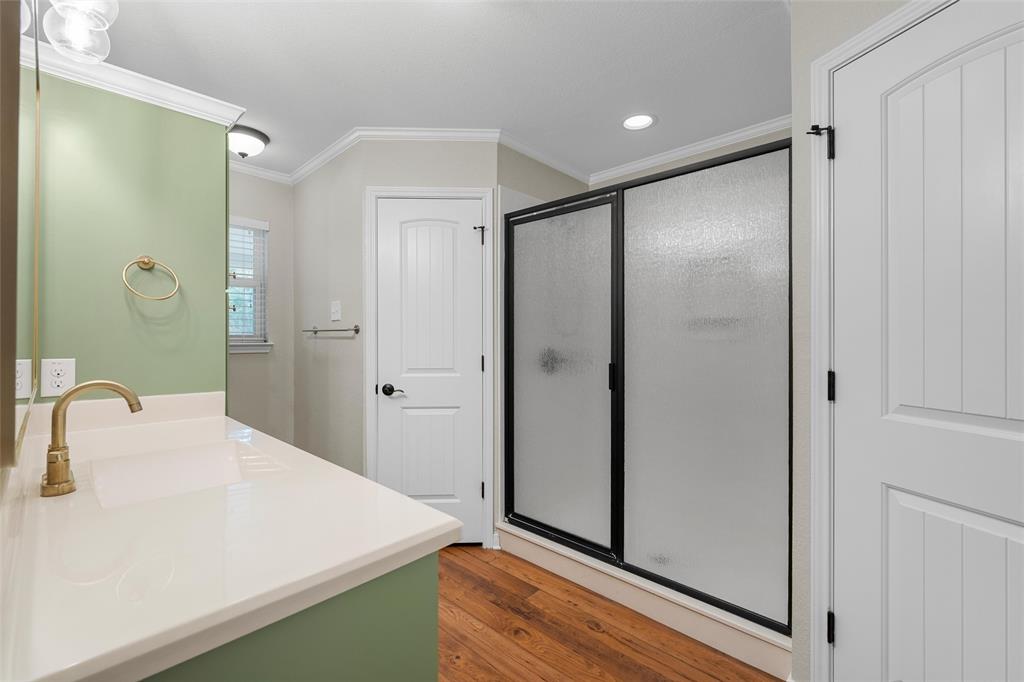 8224 Forest Ridge Drive Woodway, TX 76712 - Photo 20 of 38 a bathroom with a sink and a mirror