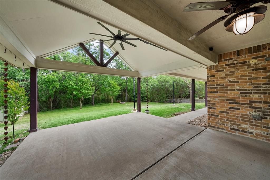 8224 Forest Ridge Drive Woodway, TX 76712 - Photo 27 of 38 a view of a house with a yard
