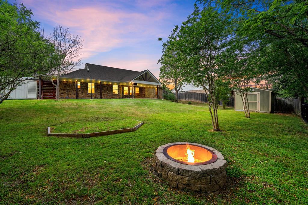 8224 Forest Ridge Drive Woodway, TX 76712 - Photo 32 of 38 front view of a house with a yard